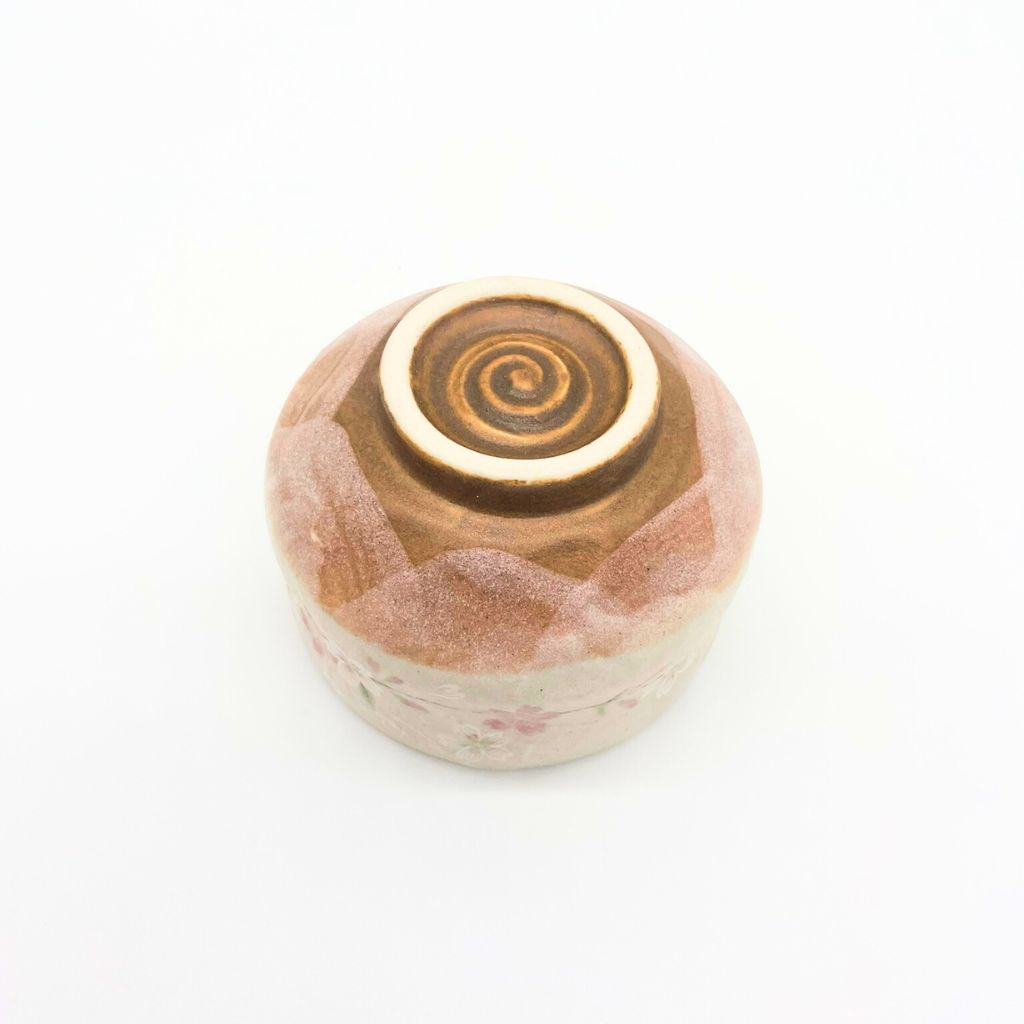 Close-up of the bottom of a Sakura Matcha Bowl, showing the unglazed base.