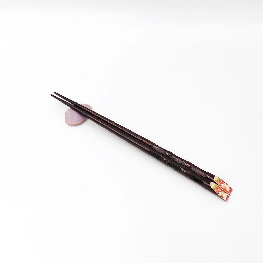 top down angled view of chopsticks resting on purple Kyo Yaki Chopstick Rest