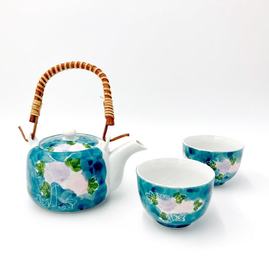 top down angled view of light Blue Floral Uwade Kyūsu Teapot with two matching cups