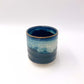 top down angled view of Sushi Yunomi blue ceramic mug