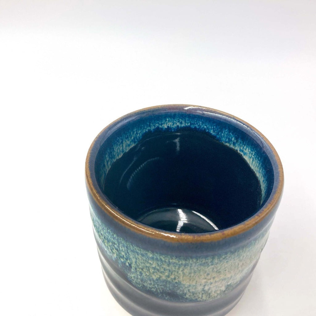 top down view of Sushi Yunomi blue ceramic mug showing glazed interior