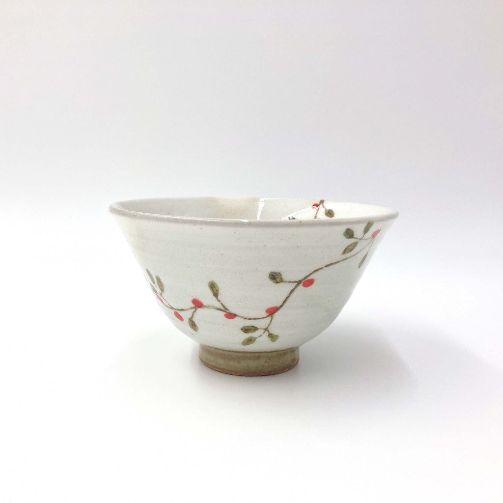 Side view of Hanatsunagi Bowl showing floral pattern