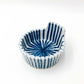 top down angled view of ceramic blue and white striped Togusa Condiment Holder