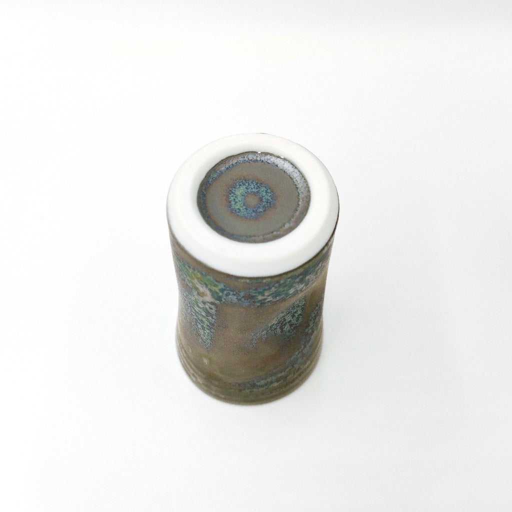 view of base of ceramic Tenmoku Cup with oil drop glaze