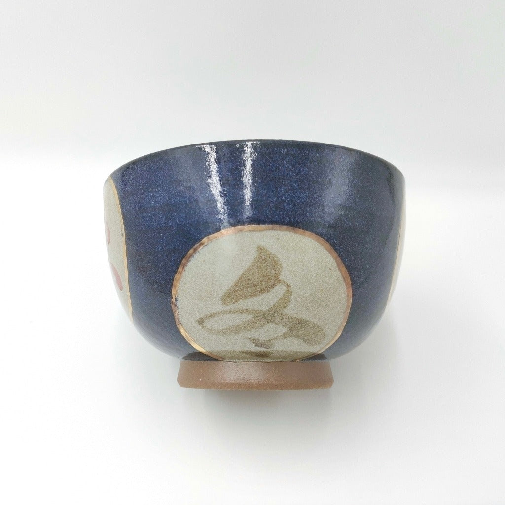 side view of ceramic Shunka-Shuto Donburi bowl showing gold chinese character