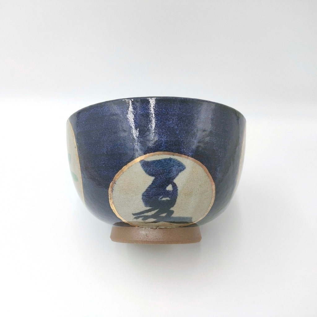 side view of ceramic Shunka-Shuto Donburi bowl showing blue chinese character