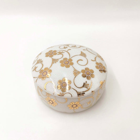 top down angled view of white ceramic Tetsuen Jewelry Box with golden arabesque design