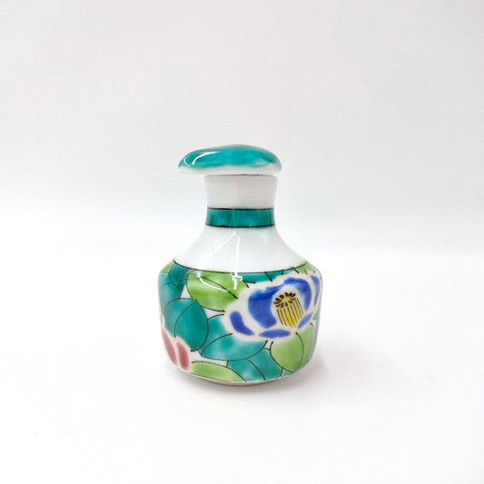 side view of ceramic Tsubaki Soy Sauce Bottle with floral detailing