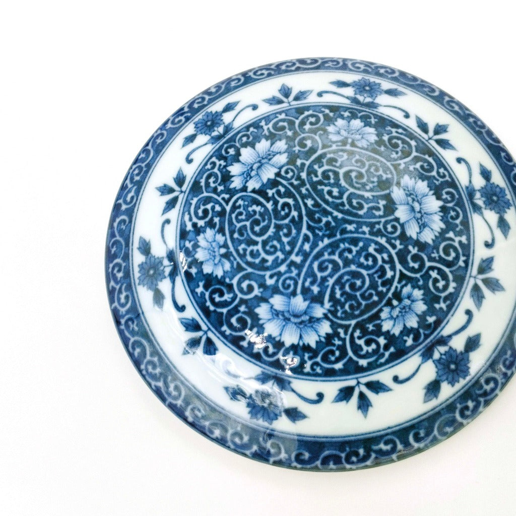 top down view of blue ceramic Three Tiered Jūbako displaying intricate floral pattern
