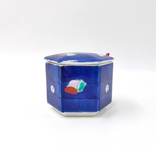 side view of blue ceramic Sazanka Condiment Holder with floral pattern