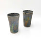 view of a matching pair of ceramic Tenmoku Cup with oil drop glaze finish