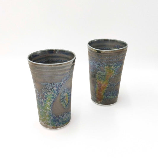 view of a matching pair of ceramic Tenmoku Cup with oil drop glaze finish