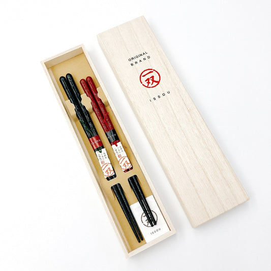 Top-down view of set of two ISSOU chopsticks inside wooden case