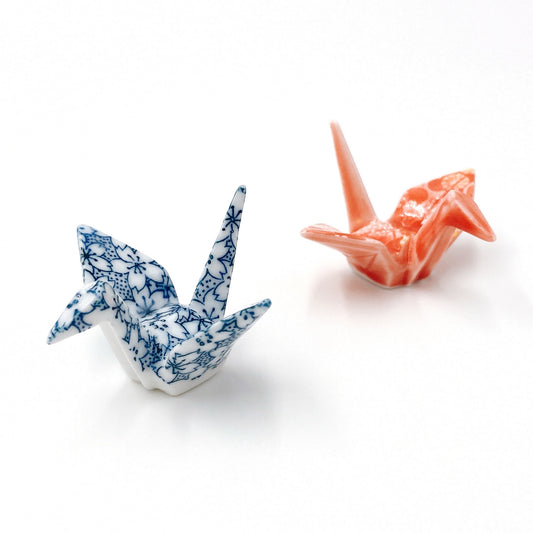 top down angled view showing blue and red Patterned ceramic Chopstick rests